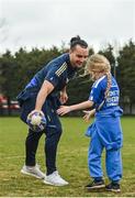 30 March 2022; In attendance at the launch of Leinster Rugby Summer Camps is James Lowe of Leinster with Fiadh Bel Molloy, aged 9, at St Mary's College RFC in Dublin. Photo by Sam Barnes/Sportsfile