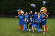 30 March 2022; In attendance at the launch of Leinster Rugby Summer Camps are, backrow from left, mascot Leona the Lioness, Leinster players Ali Coleman, James Lowe, Jordan Larmour and Aoife Wafer, and mascot Leo the Lion, with front row, from left, Fiadh Bel Molloy, Kaleb McCallister, aged 12, aged 9, James Mullrooney, aged 10, and Holly O'Dell, aged 11 at St Mary's College RFC in Dublin. Photo by Sam Barnes/Sportsfile