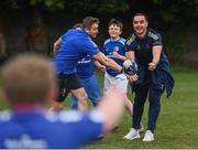 30 March 2022; In attendance at the launch of Leinster Rugby Summer Camps are Leinster players Jordan Larmour, left, and James Lowe at St Mary's College RFC in Dublin. Photo by Sam Barnes/Sportsfile