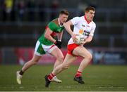 19 March 2022; Peter Harte of Tyrone in action against David McBrien of Mayo during the Allianz Football League Division 1 match between Tyrone and Mayo at O'Neill's Healy Park in Omagh, Tyrone. Photo by Stephen McCarthy/Sportsfile