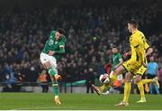 29 March 2022; Troy Parrott of Republic of Ireland shoots to score his side's first goal during the international friendly match between Republic of Ireland and Lithuania at the Aviva Stadium in Dublin. Photo by Eóin Noonan/Sportsfile
