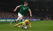 29 March 2022; Nathan Collins of Republic of Ireland in action against Augustinas Klimavicius of Lithuania during the international friendly match between Republic of Ireland and Lithuania at the Aviva Stadium in Dublin. Photo by Eóin Noonan/Sportsfile