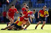 31 March 2022; Lucas Sherwood of Catholic University School is tackled by Charlie Byrne of St Fintans High School during the Bank of Ireland Vinnie Murray Cup Final match between St Fintan's High School and Catholic University School at Energia Park in Dublin. Photo by Harry Murphy/Sportsfile