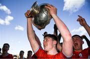 31 March 2022; Catholic University School captain Andrew Tonge with the trophy after the Bank of Ireland Vinnie Murray Cup Final match between St Fintan's High School and Catholic University School at Energia Park in Dublin. Photo by Harry Murphy/Sportsfile