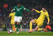 29 March 2022; Chiedozie Ogbene of Republic of Ireland in action against Edgaras Utkus of Lithuania during the international friendly match between Republic of Ireland and Lithuania at the Aviva Stadium in Dublin. Photo by Eóin Noonan/Sportsfile