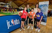 1 April 2022; In attendance at the draw for the 2022 Jr NBA Draft at the National Basketball Arena in Dublin, are, from left to right, Emma Murphy, age 10, Sinead Joyce, Marketing Manager, DeCare Dental, Sean Murphy, age 12, Erin Bracken, Basketball Ireland, and Amy Crean, age 10. Photo by Ramsey Cardy/Sportsfile