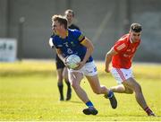 27 March 2022; Zach Cullen of Wicklow in action against Craig Lennon of Louth during the Allianz Football League Division 3 match between Wicklow and Louth at County Grounds in Aughrim, Wicklow. Photo by Matt Browne/Sportsfile
