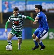 1 April 2022; Jack Byrne of Shamrock Rovers in action against Barry McNamee of Finn Harps during the SSE Airtricity League Premier Division match between Finn Harps and Shamrock Rovers at Finn Park in Ballybofey, Donegal. Photo by Ramsey Cardy/Sportsfile