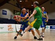 1 April 2022; Conor O'Kelly of UCD Lions in action against Kieran O'Sullivan of Killarney Cougars during the InsureMyHouse.ie Masters Over 50’s Men National Cup Final match between Killarney Cougars and UCD Lions at the National Basketball Arena in Dublin. Photo by Sam Barnes/Sportsfile