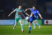 1 April 2022; Barry McNamee of Finn Harps in action against Gary O'Neill of Shamrock Rovers during the SSE Airtricity League Premier Division match between Finn Harps and Shamrock Rovers at Finn Park in Ballybofey, Donegal. Photo by Ramsey Cardy/Sportsfile