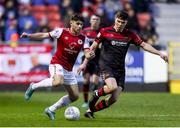 1 April 2022; Adam O'Reilly of St Patrick's Athletic in action against James Clarke of Drogheda United during the SSE Airtricity League Premier Division match between St Patrick's Athletic and Drogheda United at Richmond Park in Dublin. Photo by Michael P Ryan/Sportsfile