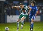 1 April 2022; Sean Hoare of Shamrock Rovers in action against Barry McNamee of Finn Harps during the SSE Airtricity League Premier Division match between Finn Harps and Shamrock Rovers at Finn Park in Ballybofey, Donegal. Photo by Ramsey Cardy/Sportsfile