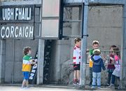 27 March 2022; Children play beneath the scoreboard during the Allianz Football League Division 2 match between Offaly and Cork at Bord na Mona O'Connor Park in Tullamore, Offaly. Photo by Sam Barnes/Sportsfile