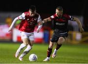 1 April 2022; Darragh Burns of St Patrick's Athletic in action against Dane Massey of Drogheda United during the SSE Airtricity League Premier Division match between St Patrick's Athletic and Drogheda United at Richmond Park in Dublin. Photo by Michael P Ryan/Sportsfile