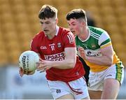 27 March 2022; Eoghan McSweeney of Cork in action against Kieran Dolan of Offaly during the Allianz Football League Division 2 match between Offaly and Cork at Bord na Mona O'Connor Park in Tullamore, Offaly. Photo by Sam Barnes/Sportsfile