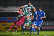 1 April 2022; Richie Towell of Shamrock Rovers and Finn Harps goalkeeper Mark McGinley collide during the SSE Airtricity League Premier Division match between Finn Harps and Shamrock Rovers at Finn Park in Ballybofey, Donegal. Photo by Ramsey Cardy/Sportsfile