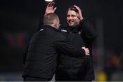 1 April 2022; Derry City manager Ruaidhrí Higgins and Derry City assistant manager Alan Reynolds celebrate after their side's victory in the SSE Airtricity League Premier Division match between Bohemians and Derry City at Dalymount Park in Dublin. Photo by Harry Murphy/Sportsfile