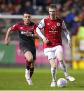 1 April 2022; Mark Doyle of St Patrick's Athletic in action against Chris Lyons of Drogheda United during the SSE Airtricity League Premier Division match between St Patrick's Athletic and Drogheda United at Richmond Park in Dublin. Photo by Michael P Ryan/Sportsfile