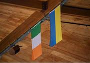 2 April 2022; A Ukrainian flag hangs alongside an Irish tricolour during the InsureMyVan.ie Men’s U20 National League Plate Final match between Sligo All-Stars and Templeogue BC, Dublin, at the National Basketball Arena in Dublin. Photo by Brendan Moran/Sportsfile
