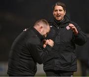 1 April 2022; Derry City manager Ruaidhrí Higgins and Derry City assistant manager Alan Reynolds celebrate after their side's victory in the SSE Airtricity League Premier Division match between Bohemians and Derry City at Dalymount Park in Dublin. Photo by Harry Murphy/Sportsfile