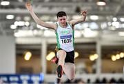 2 April 2022; Andrew Power of Craughwell AC, Galway, competing in the boys U18 triple jump  during day three of the Irish Life Health National Juvenile Indoor Championships at TUS International Arena in Athlone, Westmeath. Photo by Sam Barnes/Sportsfile