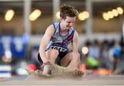 2 April 2022; Christopher Admirand of Dundrum South Dublin AC, competing in the boys U18 triple jump during day three of the Irish Life Health National Juvenile Indoor Championships at TUS International Arena in Athlone, Westmeath. Photo by Sam Barnes/Sportsfile