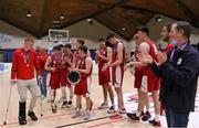 2 April 2022; Templeogue players celebrate with the plate after the InsureMyVan.ie Men’s U20 National League Plate Final match between Sligo All-Stars and Templeogue BC, Dublin, at the National Basketball Arena in Dublin. Photo by Daniel Tutty/Sportsfile