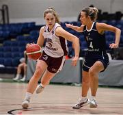 2 April 2022; Kara McCleane of NUIG Mystics in action against Lexi Posset of Ulster University during the MissQuote.ie Division 1 League Cup Final match between NUIG Mystics, Galway and Ulster University, Antrim, at the National Basketball Arena in Dublin. Photo by Brendan Moran/Sportsfile