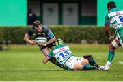 2 April 2022; Jack Carty of Connacht is tackled by Ignacio Brex of Benetton during the United Rugby Championship match between Benetton and Connacht at Stadio di Monigo in Treviso, Italy. Photo by Roberto Bregani/Sportsfile