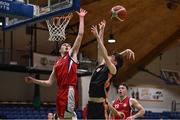 2 April 2022; Ryan Cummins of Sligo All-Stars is blocked by Callum McGrail, left, and Stepan Letsko of Templeogue BC during the InsureMyVan.ie Men’s U20 National League Plate Final match between Sligo All-Stars and Templeogue BC, Dublin, at the National Basketball Arena in Dublin. Photo by Brendan Moran/Sportsfile