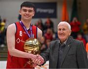 2 April 2022; Callum McGrail of Templeogue BC is presented with the MVP award by Basketball Ireland board member Tony Burke after the InsureMyVan.ie Men’s U20 National League Plate Final match between Sligo All-Stars and Templeogue BC, Dublin, at the National Basketball Arena in Dublin. Photo by Brendan Moran/Sportsfile