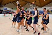 2 April 2022; Ulster University captain Aoife Callaghan and her teammates celebrate with the cup after the MissQuote.ie Division 1 League Cup Final match between NUIG Mystics, Galway and Ulster University, Antrim, at the National Basketball Arena in Dublin. Photo by Brendan Moran/Sportsfile