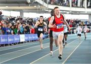 2 April 2022; Robert Carney of Ballyskenach AC, Offaly, on his way to winning the boys U17 4x200m relay during day three of the Irish Life Health National Juvenile Indoor Championships at TUS International Arena in Athlone, Westmeath. Photo by Sam Barnes/Sportsfile