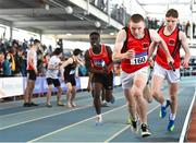2 April 2022; Robert Carney of Ballyskenach AC, Offaly, second from right, takes the baton on his way to winning the boys U17 4x200m relay during day three of the Irish Life Health National Juvenile Indoor Championships at TUS International Arena in Athlone, Westmeath. Photo by Sam Barnes/Sportsfile