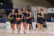 2 April 2022; Ulster University players celebrate at the final buzzer of the MissQuote.ie Division 1 League Cup Final match between NUIG Mystics, Galway and Ulster University, Antrim, at the National Basketball Arena in Dublin. Photo by Daniel Tutty/Sportsfile