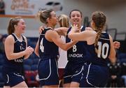 2 April 2022; Ulster University players, from left, Alexandra Mulligan, Lexi Posset, Ciara Cooke and Aoife Callaghan celebrate after  the MissQuote.ie Division 1 League Cup Final match between NUIG Mystics, Galway and Ulster University, Antrim, at the National Basketball Arena in Dublin. Photo by Brendan Moran/Sportsfile