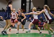 2 April 2022; Alexandra Mulligan of Ulster University in action against Ava McCleane of NUIG Mystics during the MissQuote.ie Division 1 League Cup Final match between NUIG Mystics, Galway and Ulster University, Antrim, at the National Basketball Arena in Dublin. Photo by Brendan Moran/Sportsfile