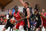 2 April 2022; Tala Fam Thiam of UCC Demons in action against Jamie Hayes of EJ Sligo All-Stars during the InsureMyVan.ie Division 1 Final match between EJ Sligo All-Stars and UCC Demons, Cork at the National Basketball Arena in Dublin. Photo by Brendan Moran/Sportsfile
