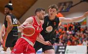 2 April 2022; Kyle Hosford of UCC Demons in action against Oisin O'Reilly of EJ Sligo All-Stars during the InsureMyVan.ie Division 1 Final match between EJ Sligo All-Stars and UCC Demons, Cork at the National Basketball Arena in Dublin. Photo by Brendan Moran/Sportsfile
