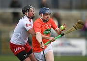 2 April 2022; Dean Gaffney of Armagh in action against Lorcan Devlin of Tyrone during the Allianz Hurling League Division 3A Final match between Tyrone and Armagh at Derry GAA Centre of Excellence in Owenbeg, Derry. Photo by Oliver McVeigh/Sportsfile