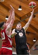 2 April 2022; Cian Lally Jr of EJ Sligo All-Stars in action against David Lehane of UCC Demons during the InsureMyVan.ie Division 1 Final match between EJ Sligo All-Stars and UCC Demons, Cork at the National Basketball Arena in Dublin. Photo by Brendan Moran/Sportsfile