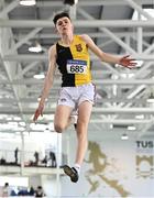 2 April 2022; Louis Raggett of Kilkenny City Harriers AC, competing in the boys U16 long jump during day three of the Irish Life Health National Juvenile Indoor Championships at TUS International Arena in Athlone, Westmeath. Photo by Sam Barnes/Sportsfile