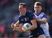 2 April 2022; Conor Sweeney of Tipperary is tackled by Evan Finnegan of Cavan during the Allianz Football League Division 4 Final match between Cavan and Tipperary at Croke Park in Dublin. Photo by Piaras Ó Mídheach/Sportsfile