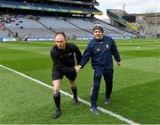 2 April 2022; Referee John Hickey shakes hands with Cavan manager Mickey Graham before the Allianz Football League Division 4 Final match between Cavan and Tipperary at Croke Park in Dublin. Photo by Piaras Ó Mídheach/Sportsfile