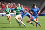 2 April 2022; Eve Higgins of Ireland evades the tackle from Cyrielle Banet of France on her way to scoring a try during the TikTok Women's Six Nations Rugby Championship match between France and Ireland at Stade Ernest Wallon in Toulouse, France. Photo by Manuel Blondeau/Sportsfile