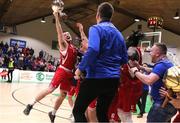 2 April 2022; Ryan Murphy of UCC Demons and teammates celebrate with the cup after the InsureMyVan.ie Division 1 Final match between EJ Sligo All-Stars and UCC Demons, Cork at the National Basketball Arena in Dublin. Photo by Daniel Tutty/Sportsfile