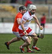 2 April 2022; Damian Casey of Tyrone in action against Tiarnan Nevin of Armagh during the Allianz Hurling League Division 3A Final match between Tyrone and Armagh at Derry GAA Centre of Excellence in Owenbeg, Derry. Photo by Oliver McVeigh/Sportsfile