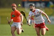 2 April 2022;  Ruari Slane of Tyrone in action against Kieran McKernan of Armagh during the Allianz Hurling League Division 3A Final match between Tyrone and Armagh at Derry GAA Centre of Excellence in Owenbeg, Derry. Photo by Oliver McVeigh/Sportsfile