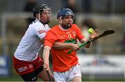 2 April 2022; Dean Gaffney of Armagh in action against Lorcan Devlin of Tyrone during the Allianz Hurling League Division 3A Final match between Tyrone and Armagh at Derry GAA Centre of Excellence in Owenbeg, Derry. Photo by Oliver McVeigh/Sportsfile