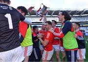 2 April 2022; Louth captain Sam Mulroy celebrates with the cup and teammates after their victory in the Allianz Football League Division 3 Final match between Louth and Limerick at Croke Park in Dublin. Photo by Piaras Ó Mídheach/Sportsfile